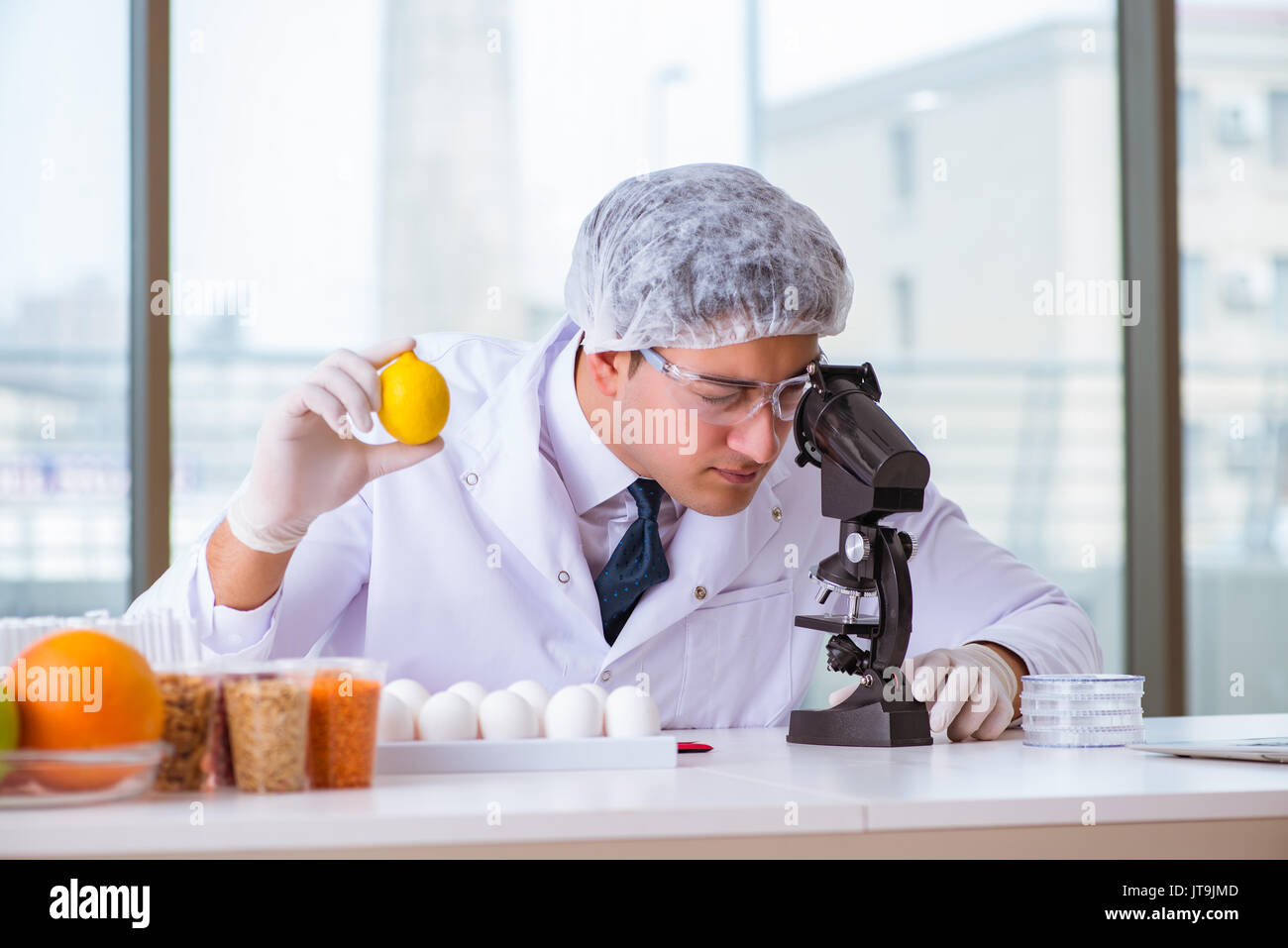 Nutrition expert testing food products in lab Stock Photo Alamy