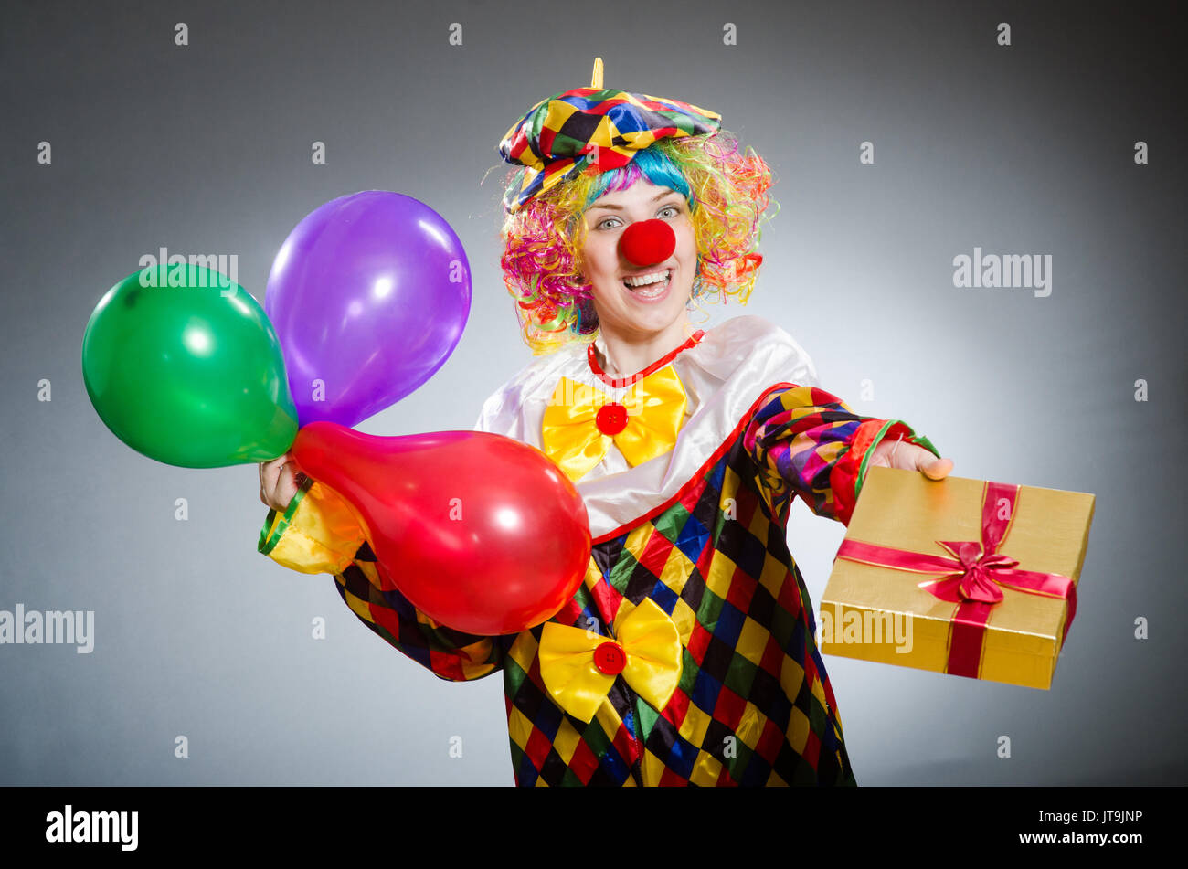 Funny clown in comical concept Stock Photo - Alamy