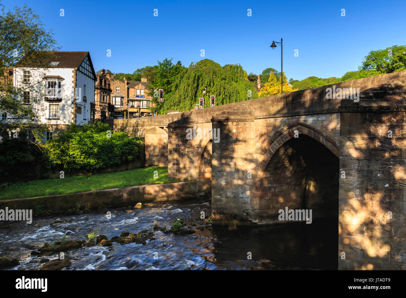 Bridge over the River Derwent in early morning light in spring, Matlock, Derbyshire Dales, Derbyshire, England, United Kingdom Stock Photo