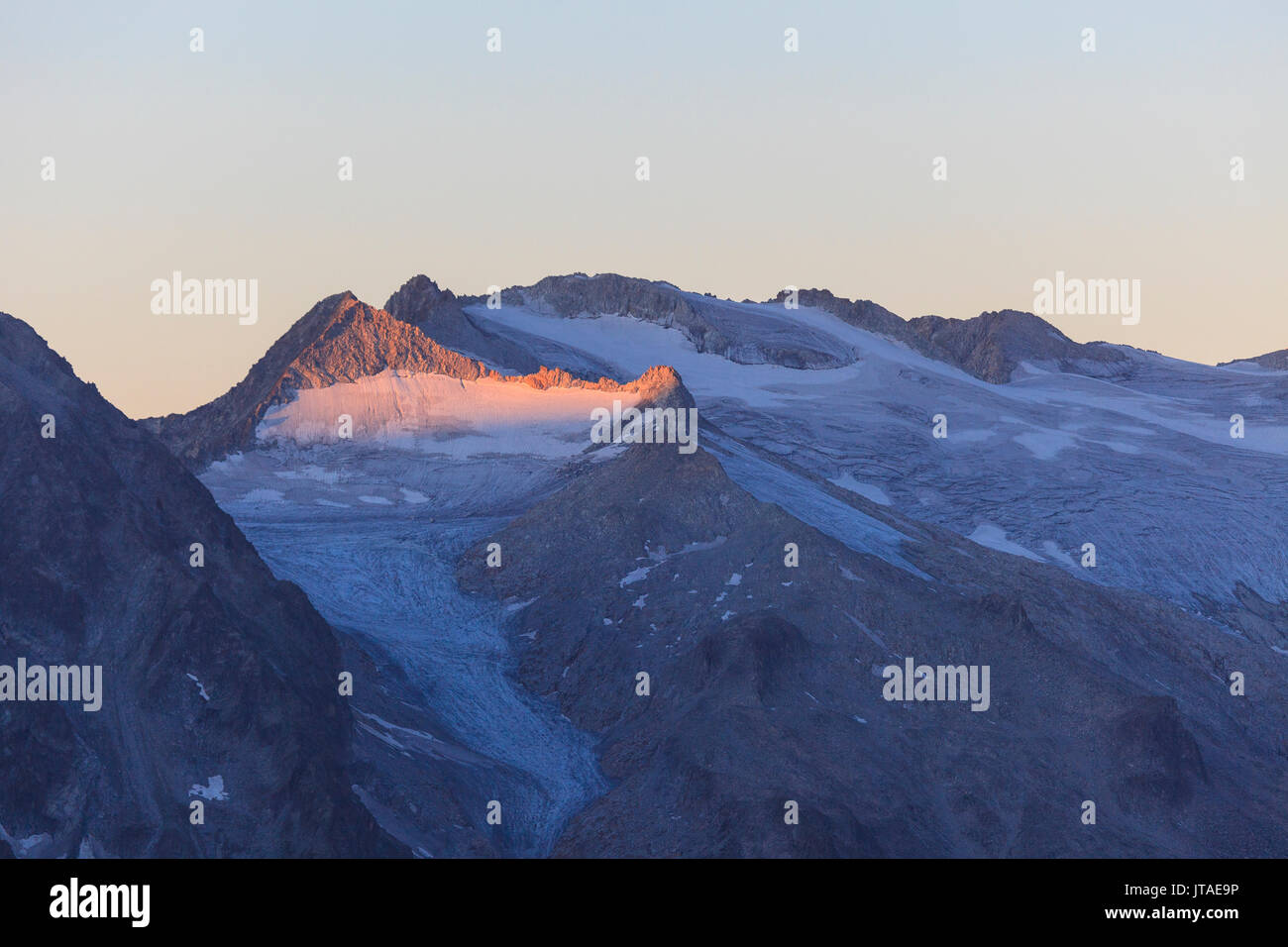 View of the Pisgana glacier and rocky peaks at dawn, Valcamonica, border Lombardy and Trentino-Alto Adige, Italy, Europe Stock Photo