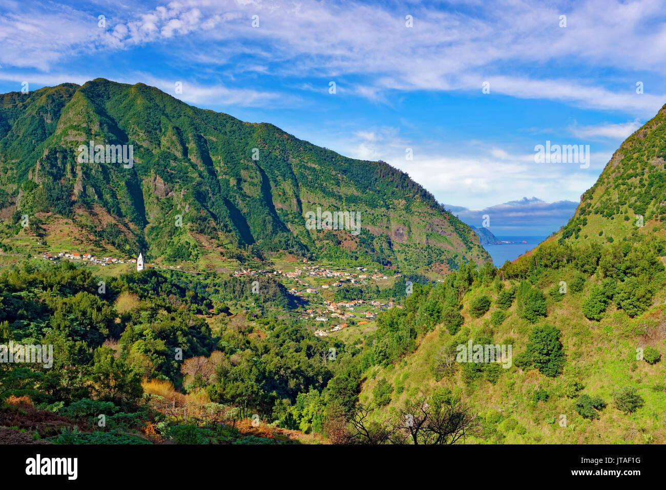 A distant view of Tower Chapel, looking towards Sao Vicente and the Atlantic Ocean, Madeira, Portugal, Atlantic Stock Photo