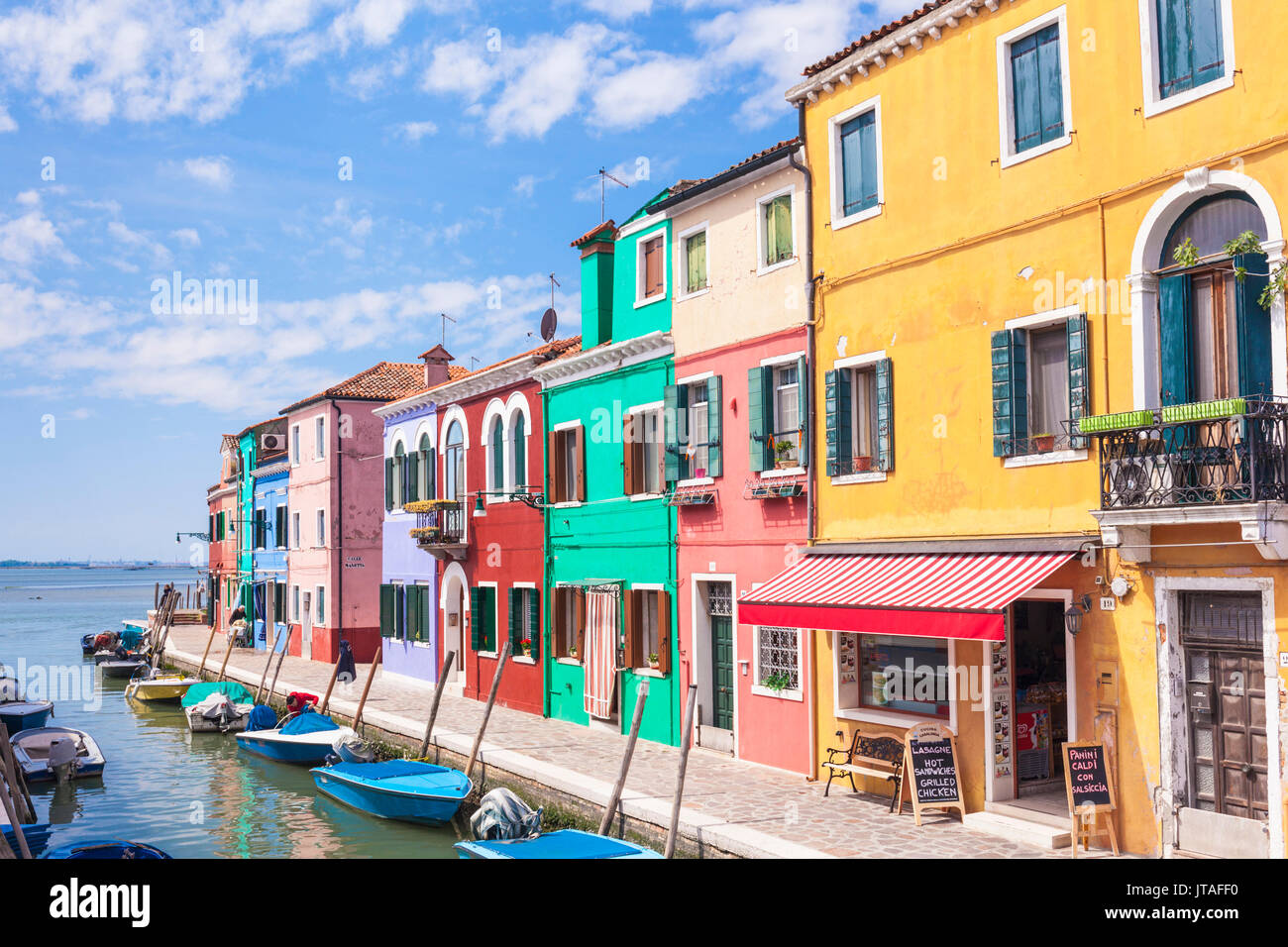 Brightly coloured fishermens cottages on the island of Burano in the Venice lagoon, Venice, UNESCO, Veneto, Italy Stock Photo