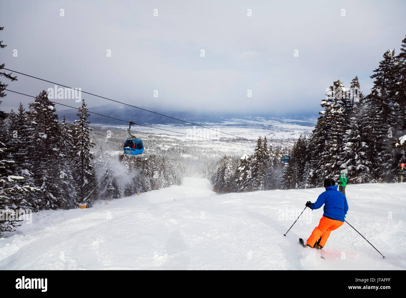 Piste skiers, Bansko resort, Bulgaria, Europe Stock Photo
