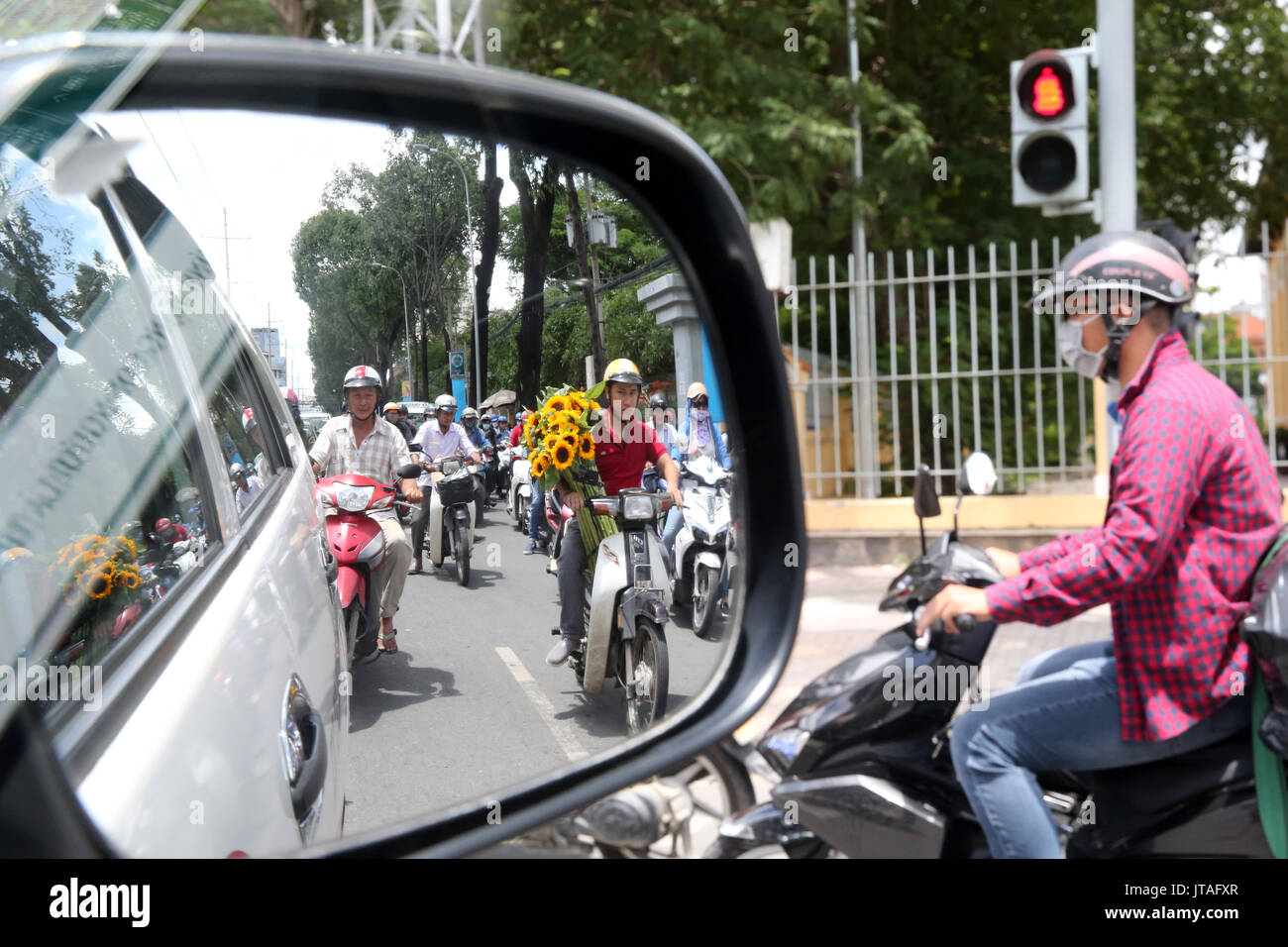Motor Scooters on Saigon Street, Ho Chi Minh City, Vietnam, Indochina, Southeast Asia, Asia Stock Photo