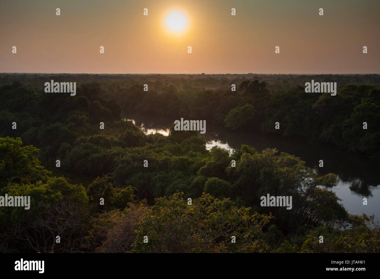 Rio Claro and surrounding forest at sunrise, Pantanal, Brazil Stock Photo