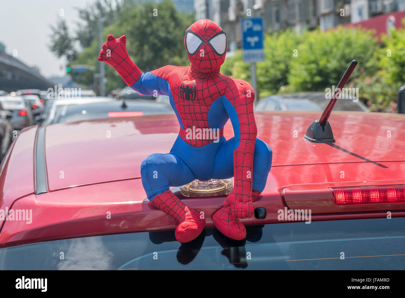 Spider-Man toy is seen on a private car in Beijing, China. 08-Aug-2017 Stock Photo