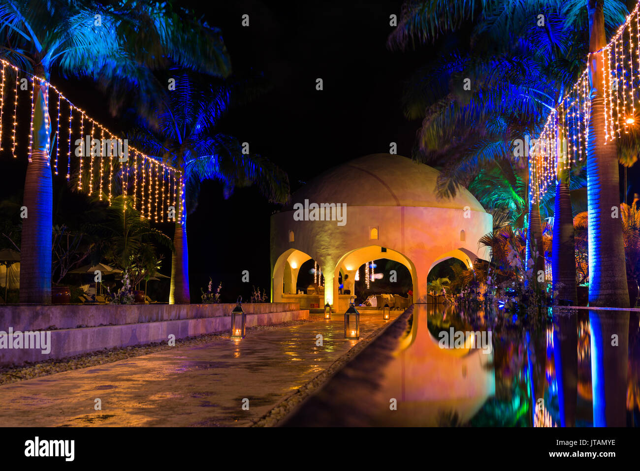 Swahili Beach Resort Exterior Reflection Pools And Dome At Night With Lights, Diani, Kenya Stock Photo