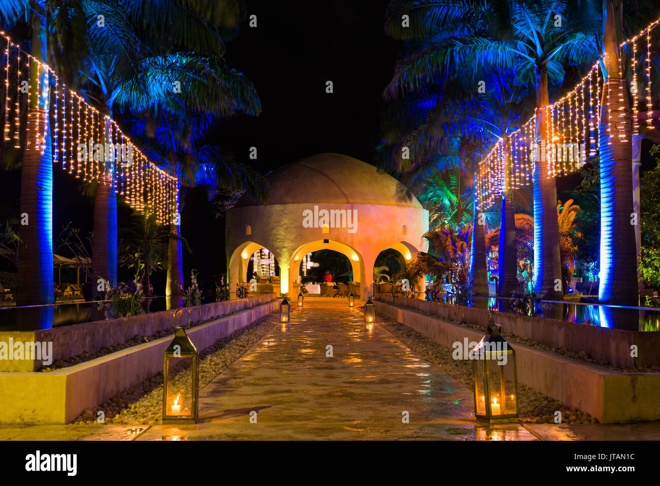 Swahili Beach Resort Exterior Reflection Pools And Dome At Night With Lights, Diani, Kenya Stock Photo