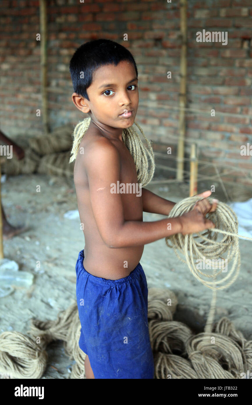 Boy pulling rope hi-res stock photography and images - Alamy