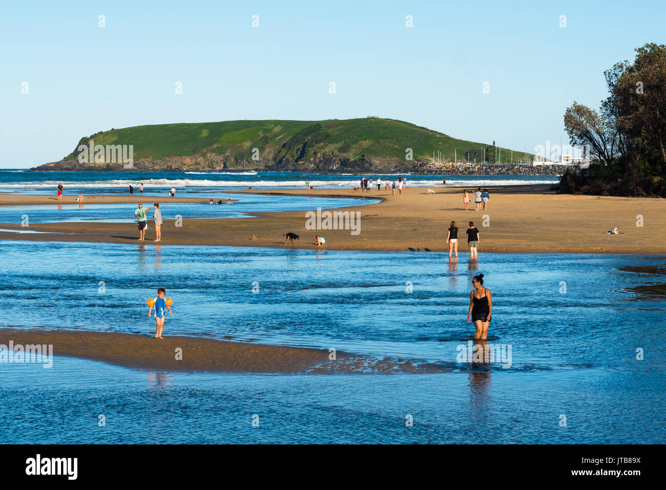 Coffs Creek reaches the sea at Park Beach resort with Mutton Bird Island to the rear, Coffs Harbour, New South Wales, Australia. Stock Photo
