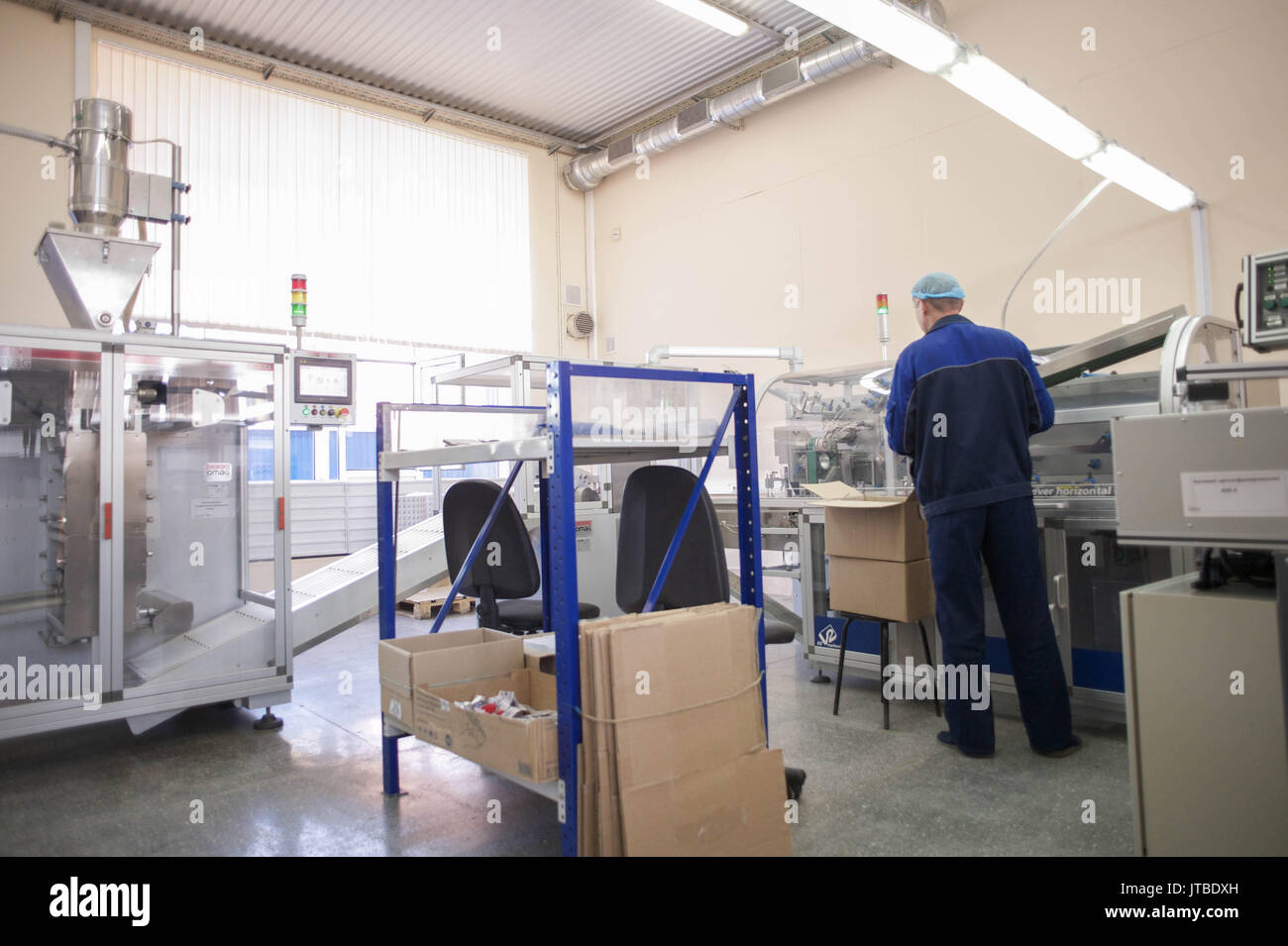Production tape in a small factory Stock Photo Alamy
