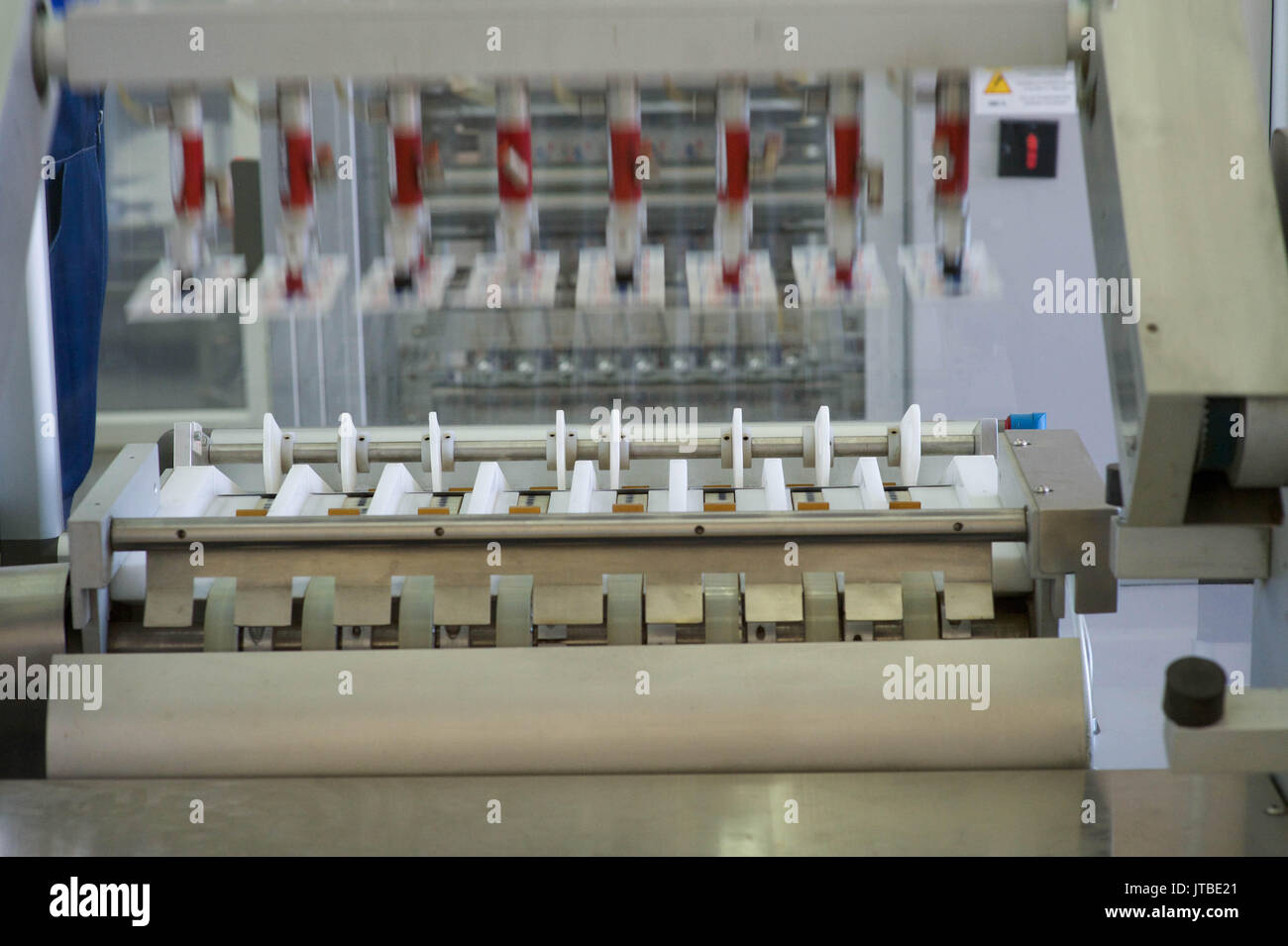 Production tape in a small factory Stock Photo Alamy