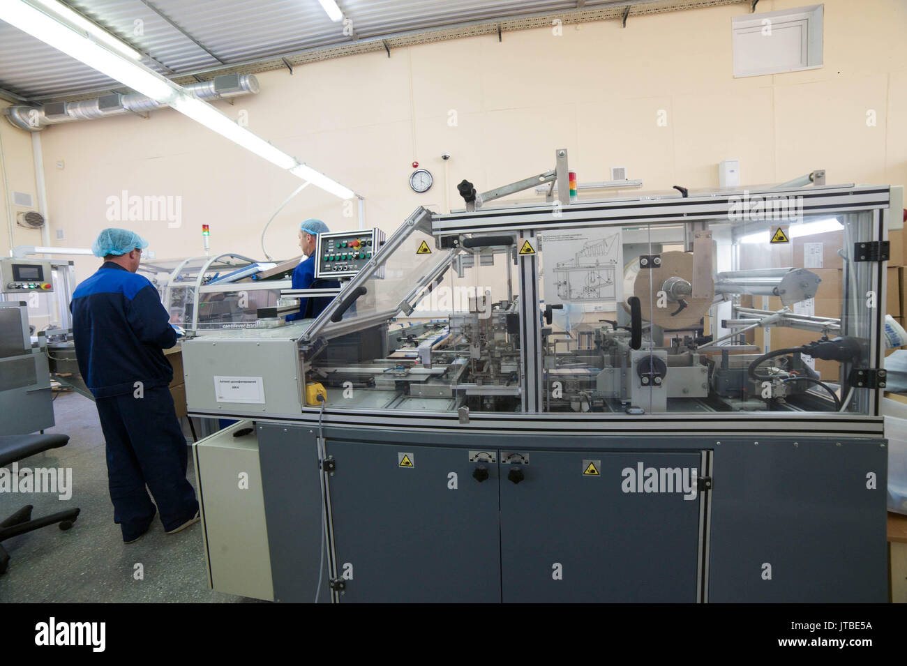 Production tape in a small factory Stock Photo Alamy