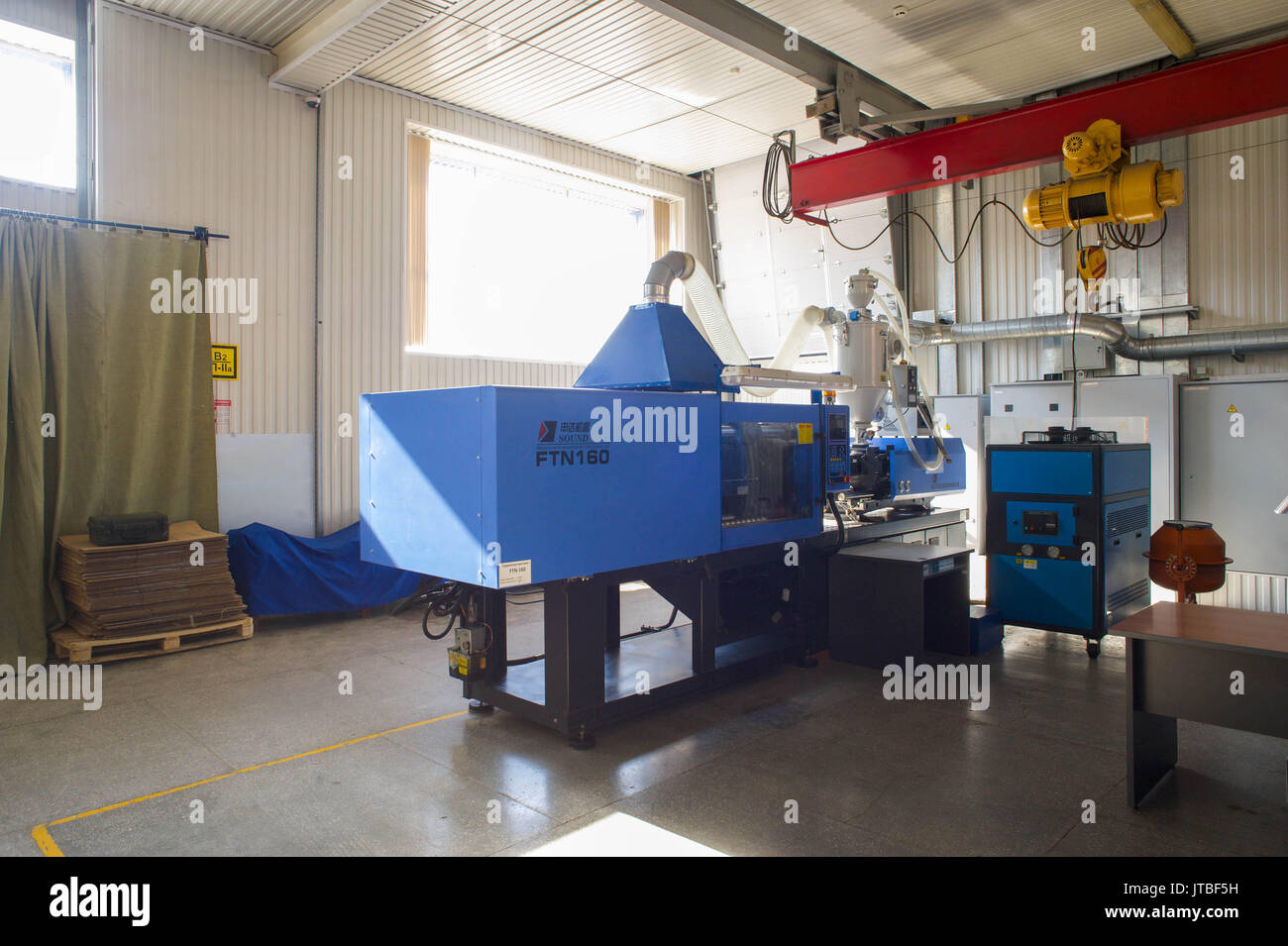 Production tape in a small factory Stock Photo Alamy