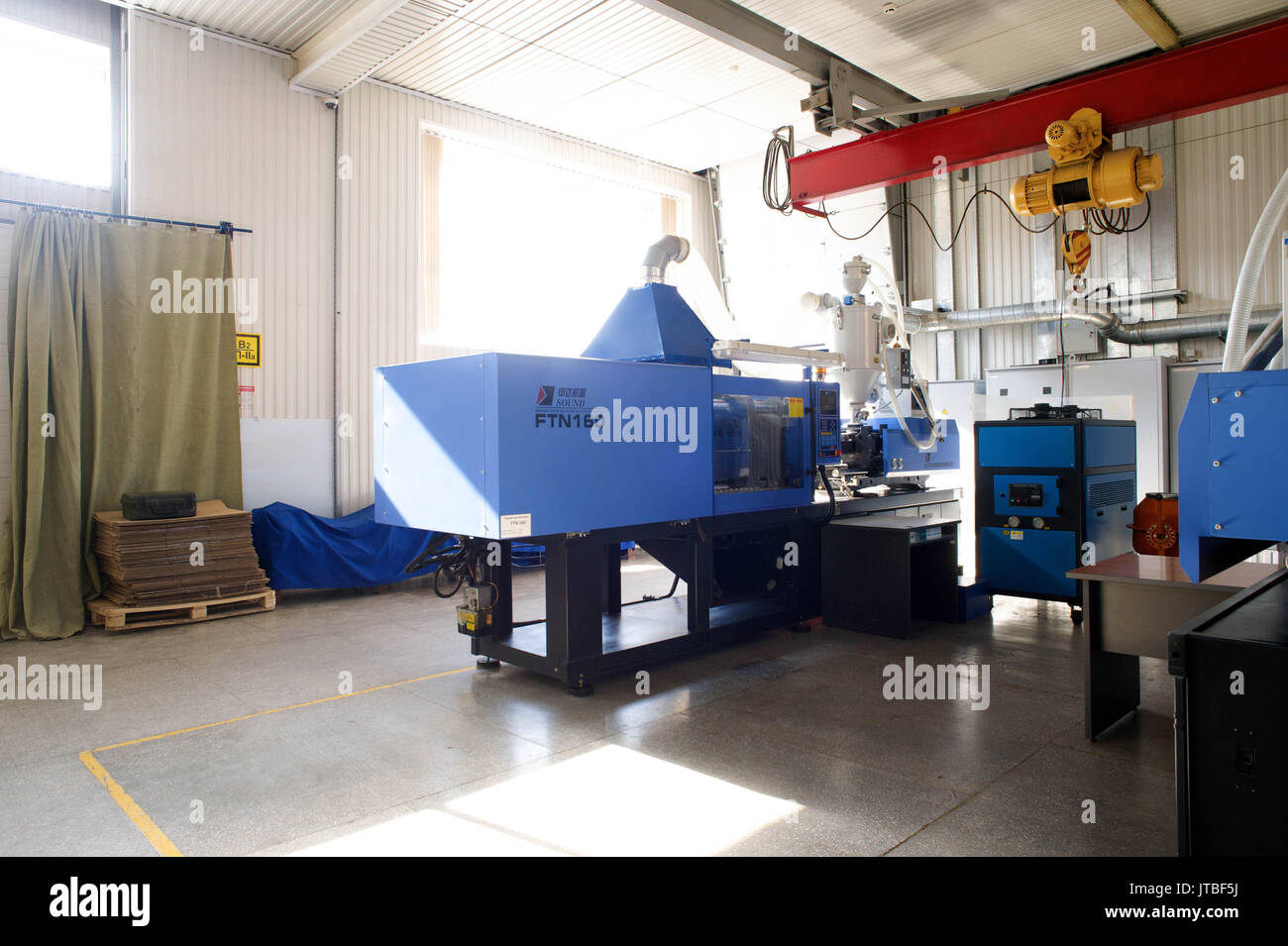 Production tape in a small factory Stock Photo Alamy