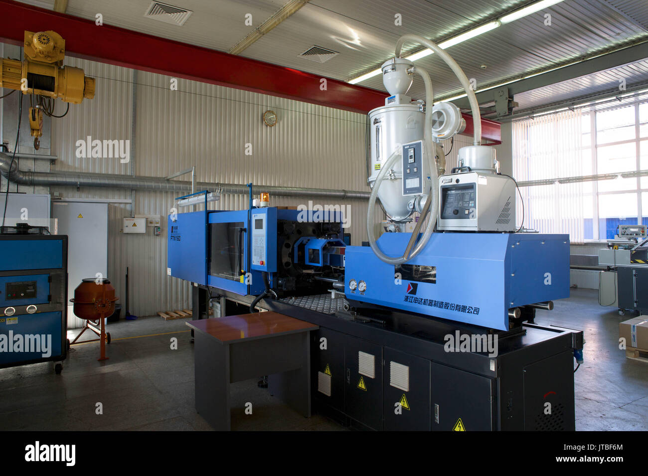 Production tape in a small factory Stock Photo Alamy