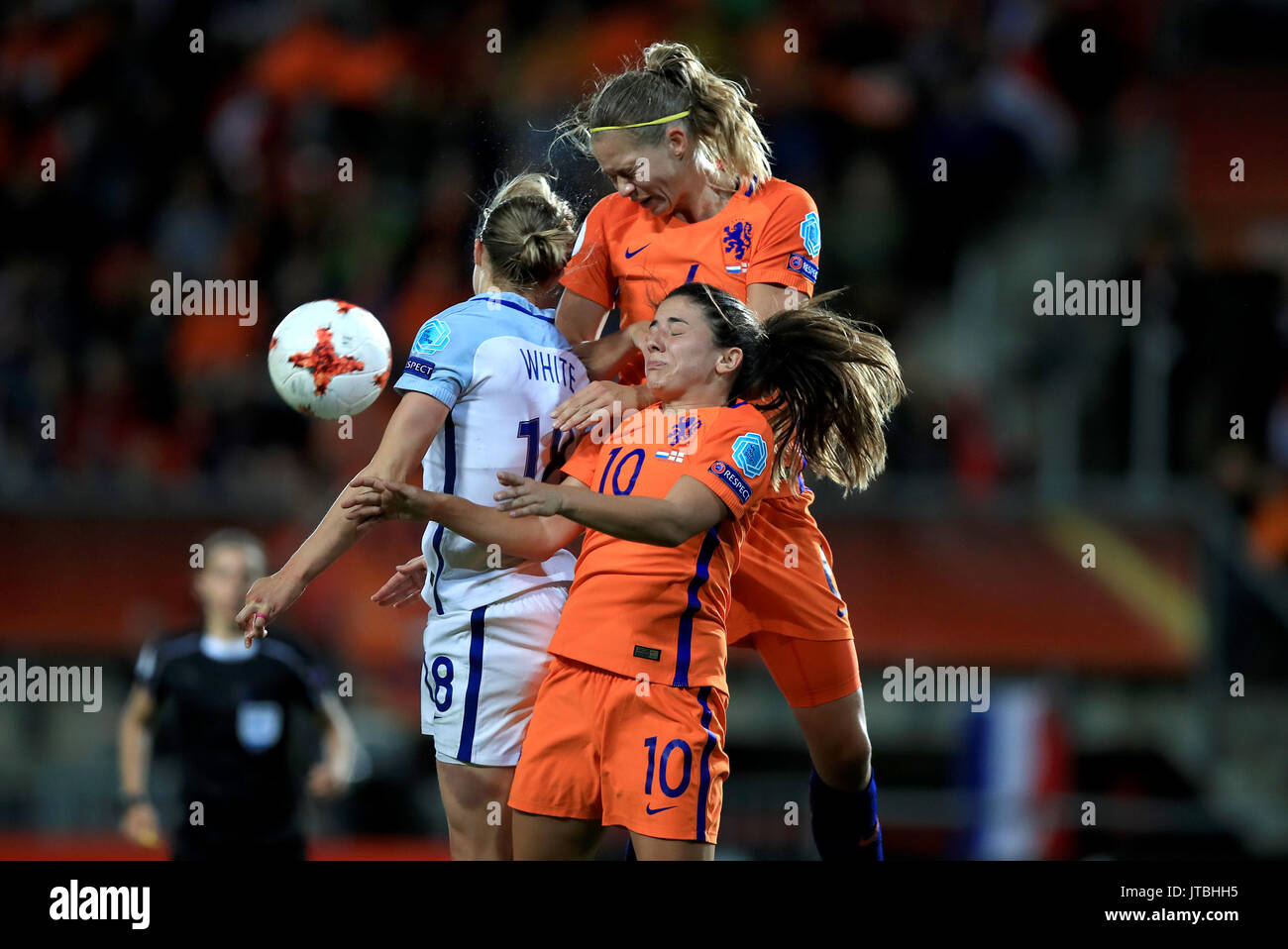 Netherlands' Danielle van de Donk (front) and Anouk Dekker battle with England's Ellen White Stock Photo