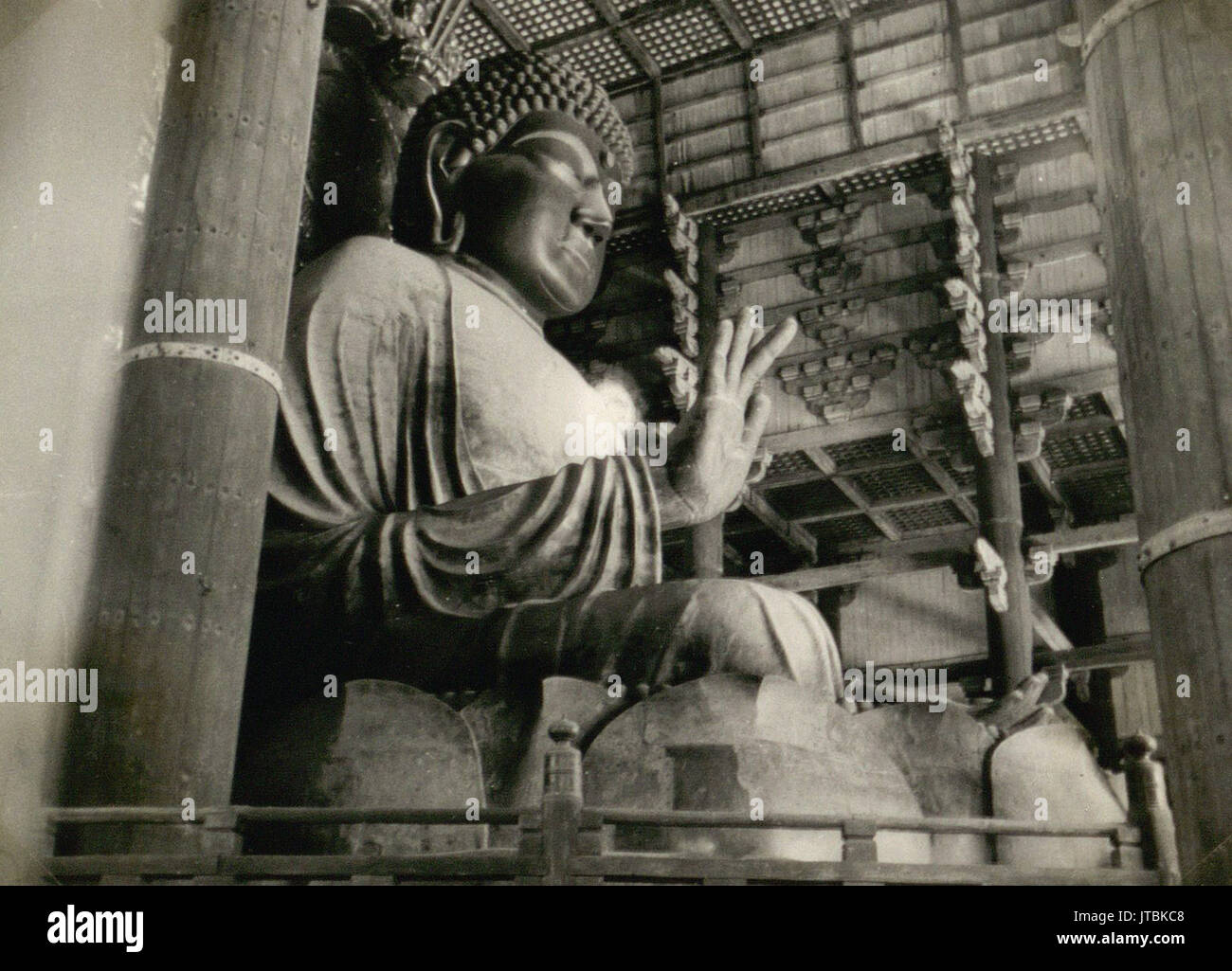 Interior of a temple with a giant Buddha, Nara, Japan. 1935 Stock Photo ...