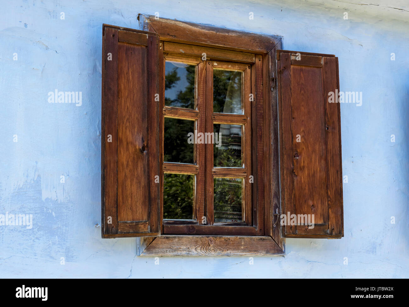 Wooden window in the Astra Museum of Traditional Folk Civilization, Sibiu, Romania Stock Photo