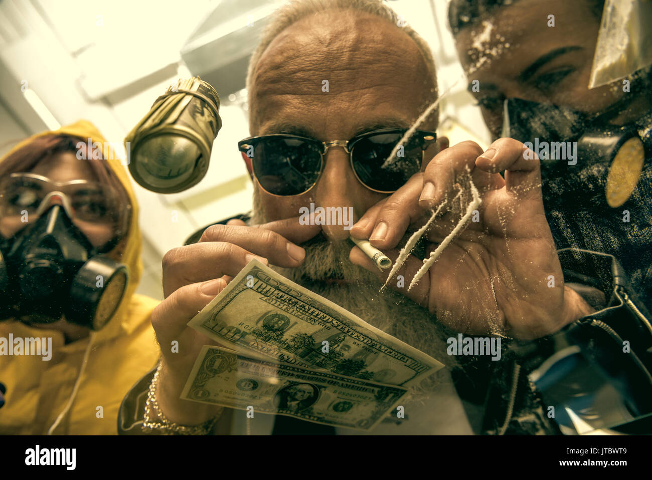 grey hair man with beard taking drugs with women in personal protective equipment, drugs concept Stock Photo