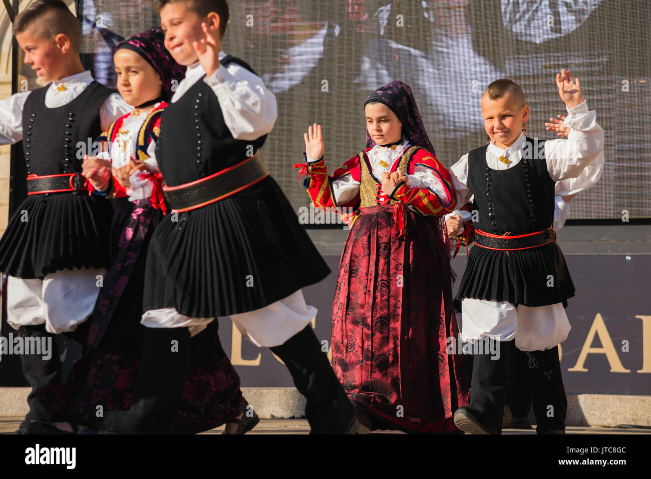 Sardinia folk festival, a children's folk dance group participate in the La Cavalcata festival in Sassari, Sardinia. Stock Photo