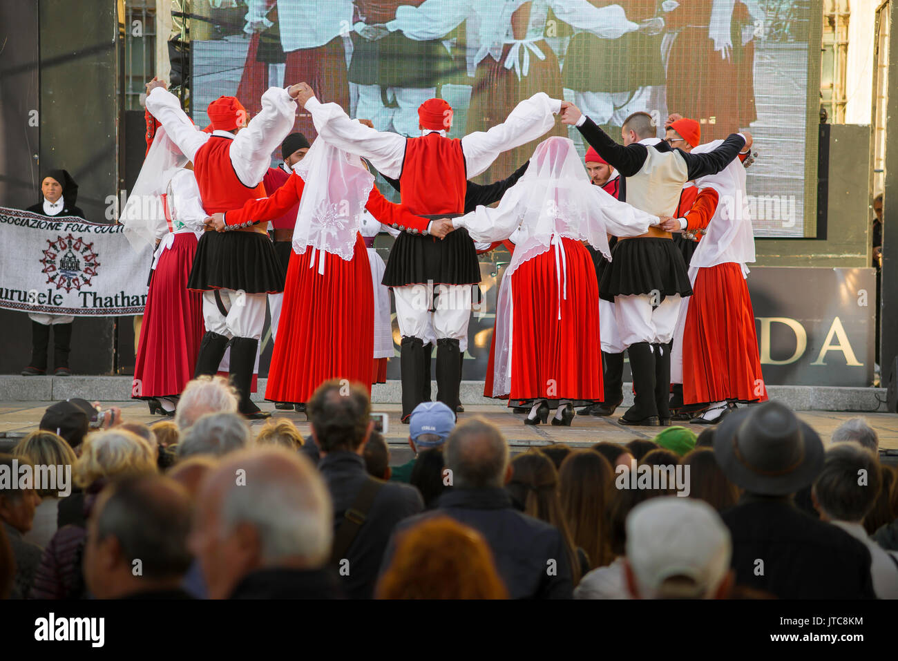 Sardinia folk festival, a folk dance group participate in the La Cavalcata festival in Sassari, Sardinia. Stock Photo
