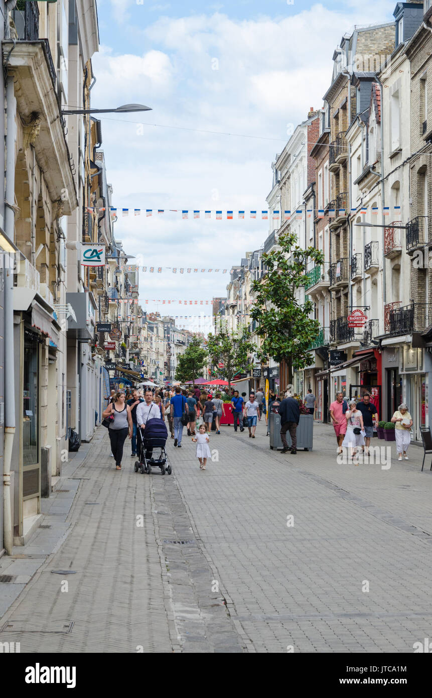 Shops and cafes lining the Grande Rue high street in the centre of Dieppe, the French port town in Normandy, Northern France Stock Photo