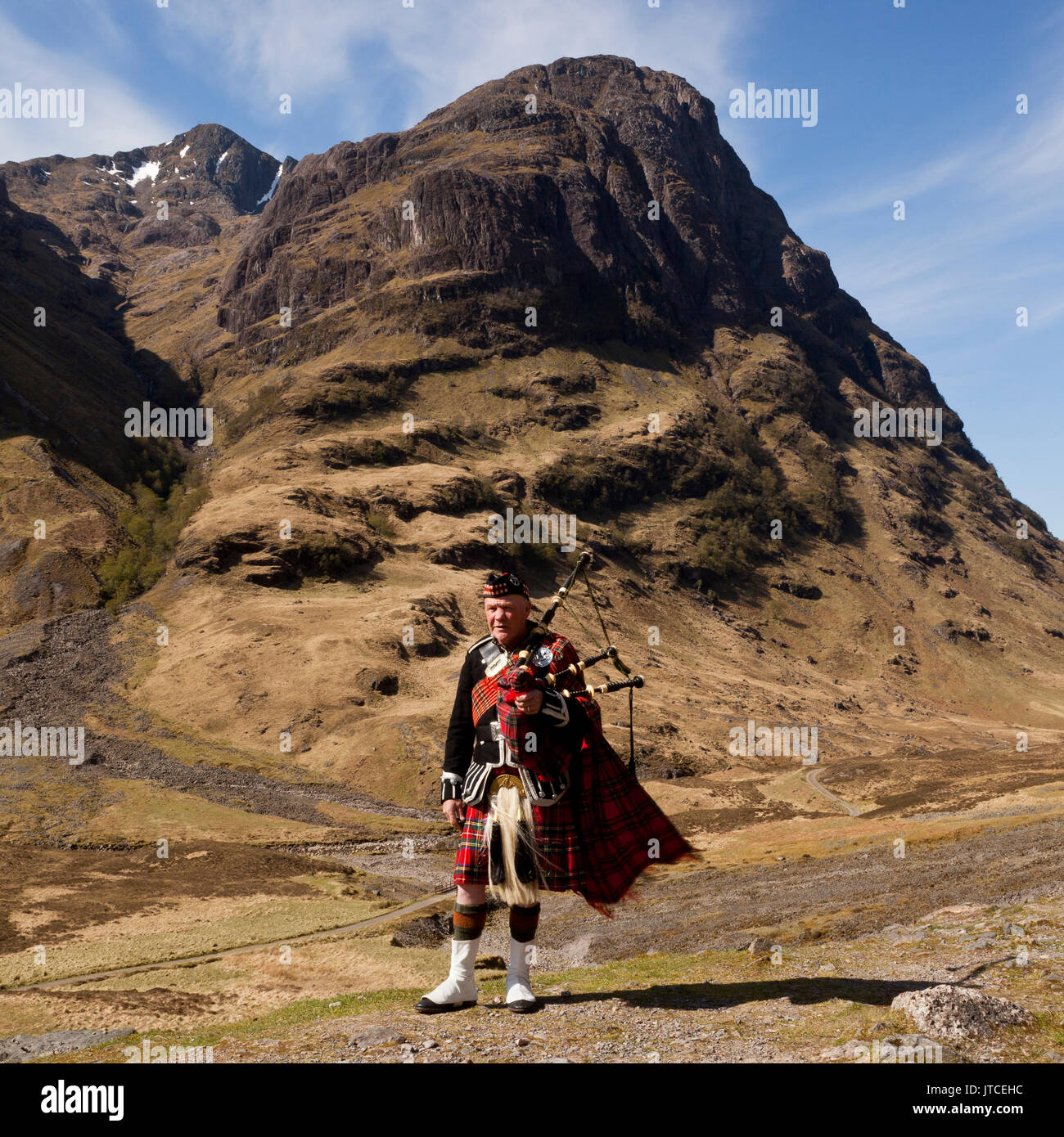 A Scottish Piper in Glencoe, Scotland, UK Stock Photo - Alamy
