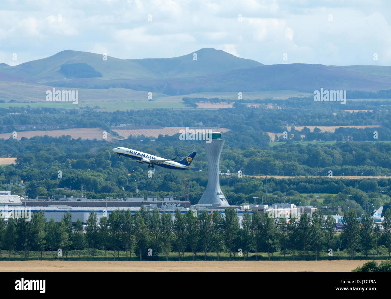 A ryanair passenger aircraft takes off from Edinburgh airport Stock