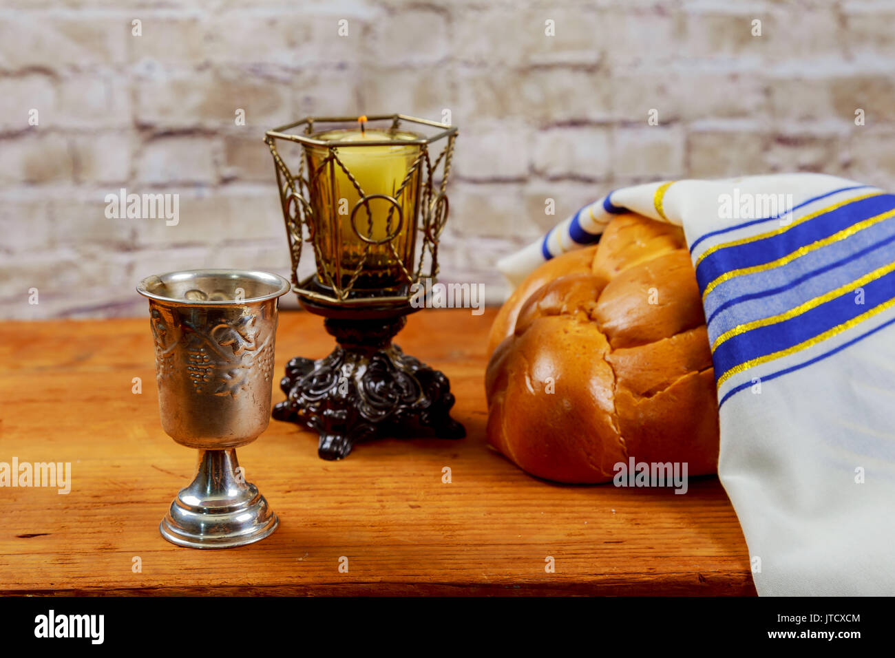 Shabbat or Sabbath kiddush ceremony composition with red kosher wine