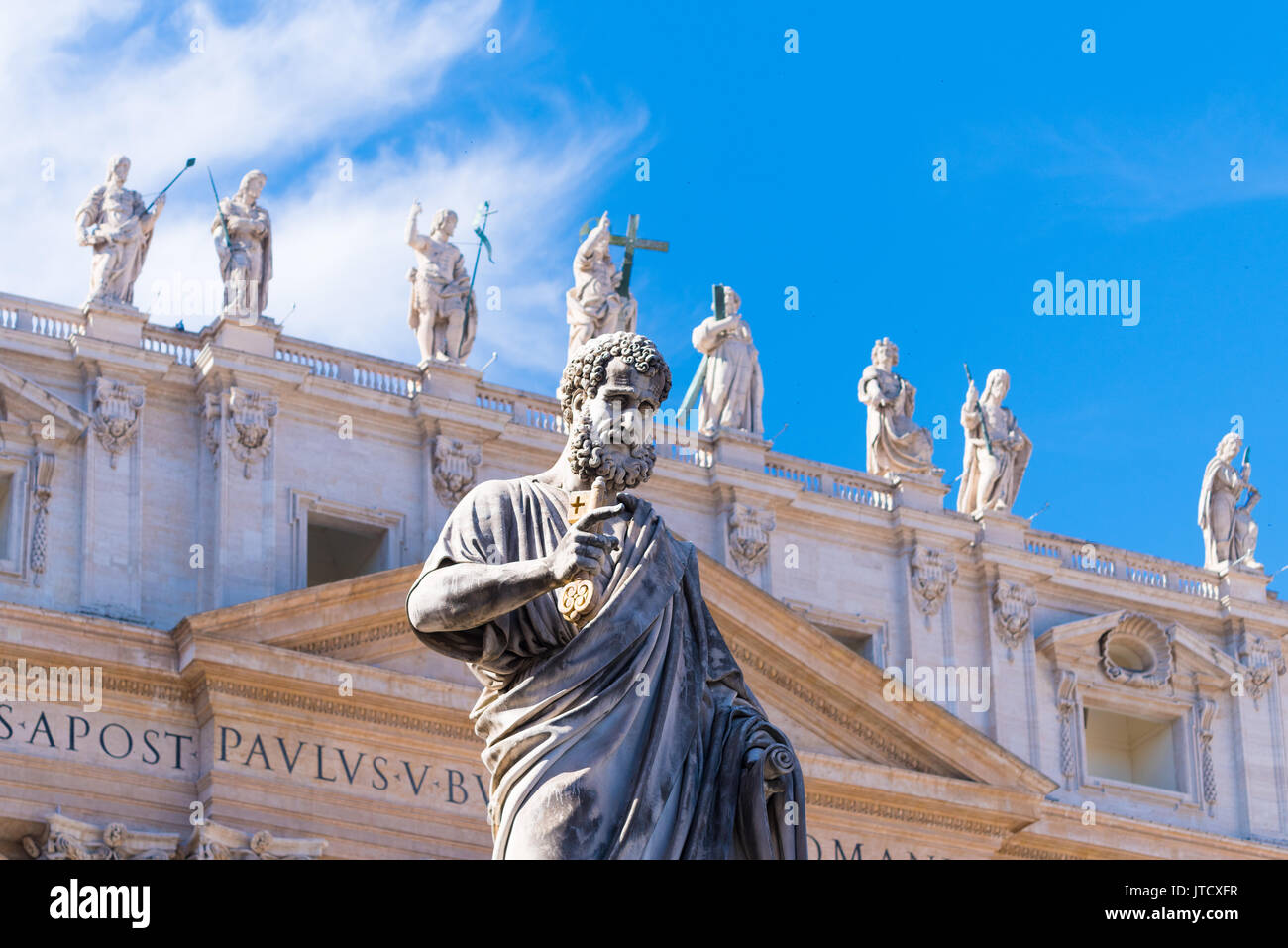 VATICAN CITY, VATICAN - OCTOBER 16, 2016: Statue Saint Peter in front of St Peter's Basilica on piazza San Pietro Stock Photo