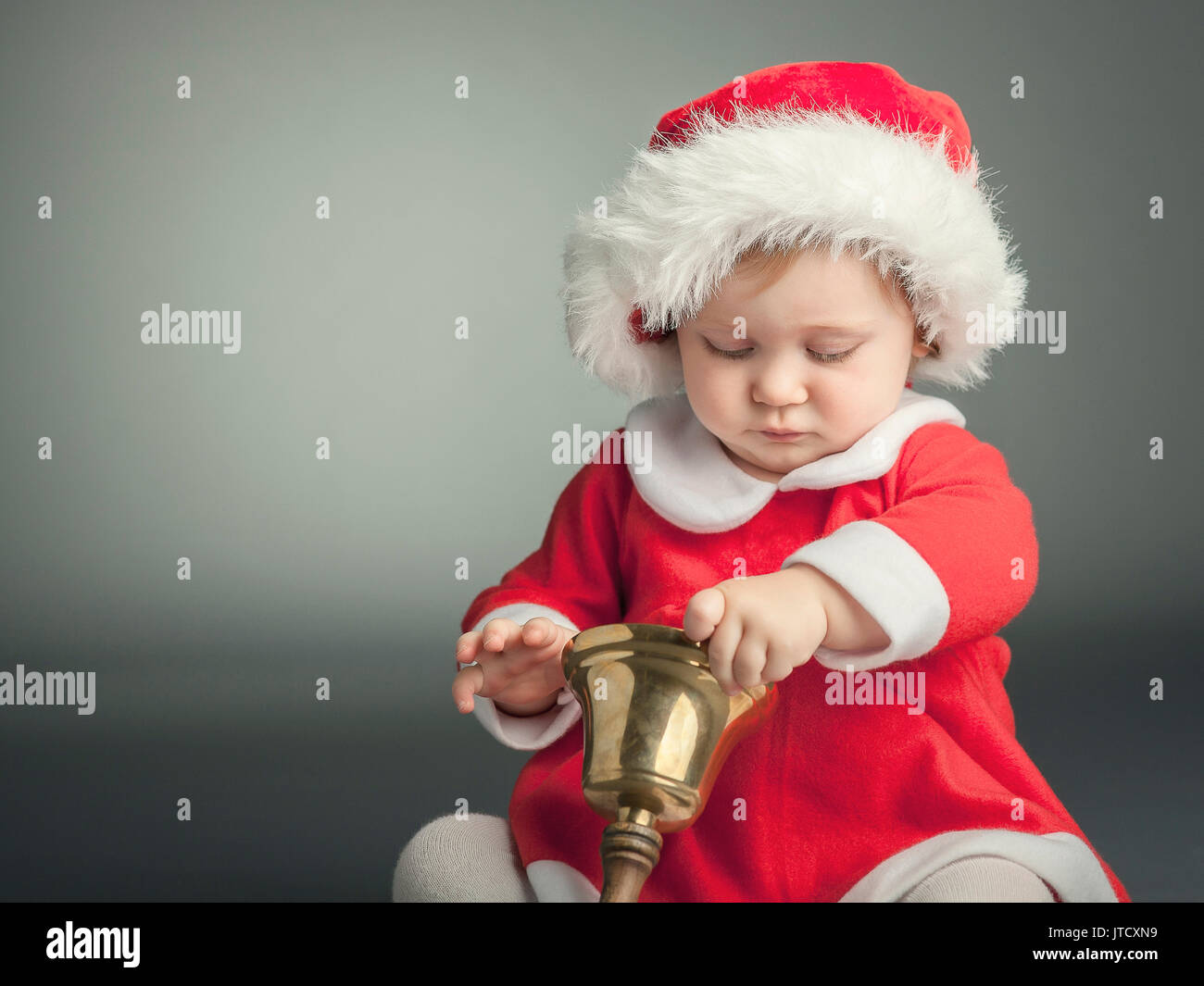 portrait of cute female caucasian child with santa claus clothes Stock Photo
