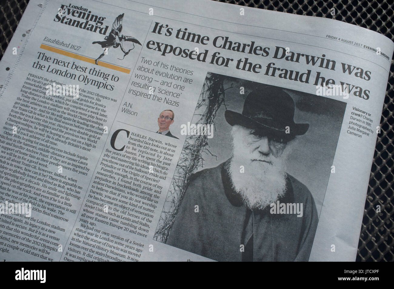 It's time Charles Darwin was exposed for the fraud he was": an article in  London's Evening Standard newspaper Stock Photo - Alamy