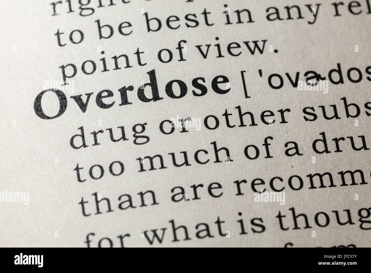 Fake Dictionary, Dictionary definition of the word overdose. including key descriptive words. Stock Photo