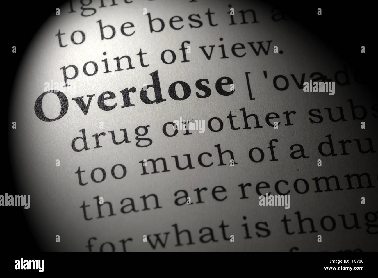 Fake Dictionary, Dictionary definition of the word overdose. including key descriptive words. Stock Photo