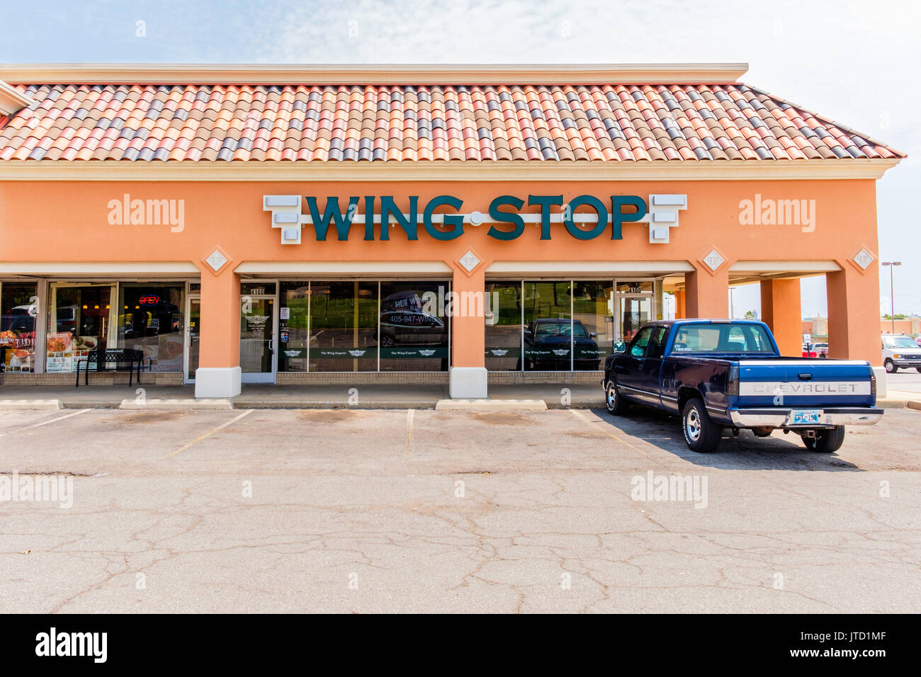 Wing Stop exterior, a business in a strip mall selling delicious chicken wings in many different seasonings in Oklahoma City, Oklahoma, USA. Stock Photo