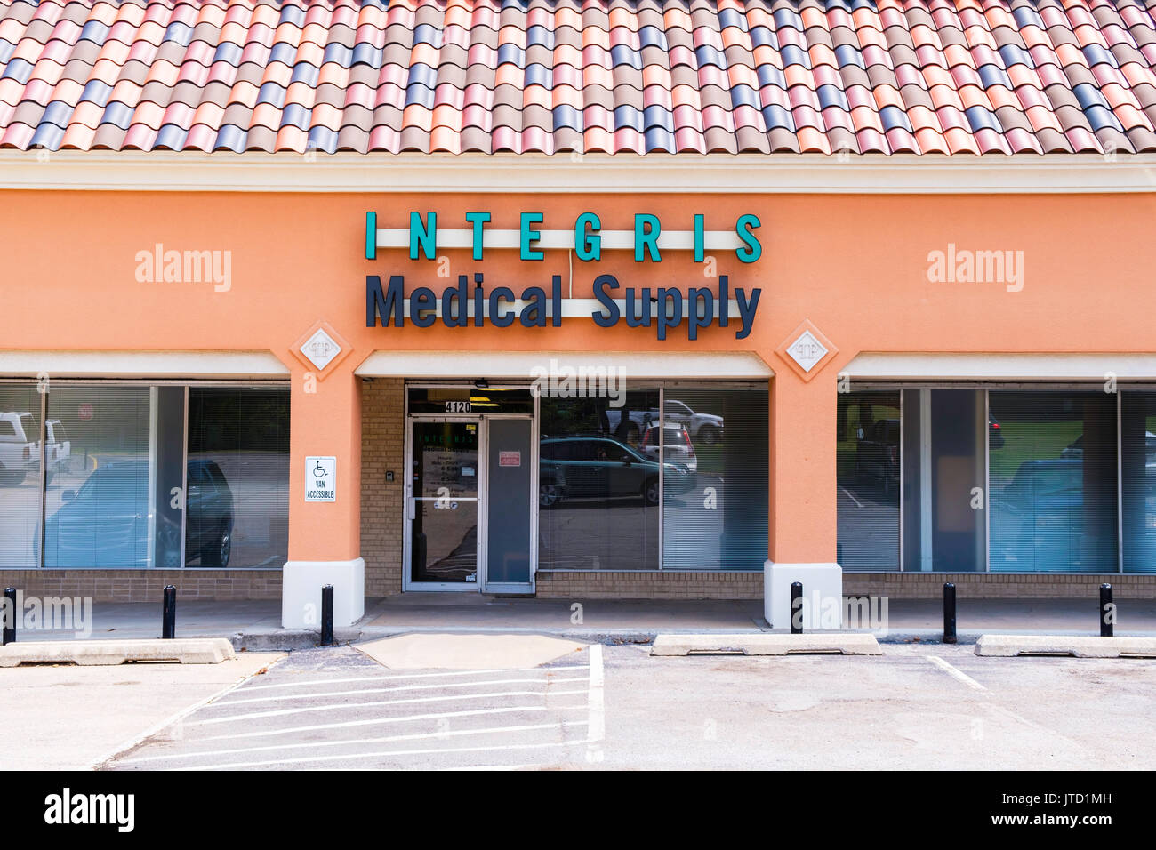 The exterior of a medical supply shop called Integris Medical Supply located in a strip mall in