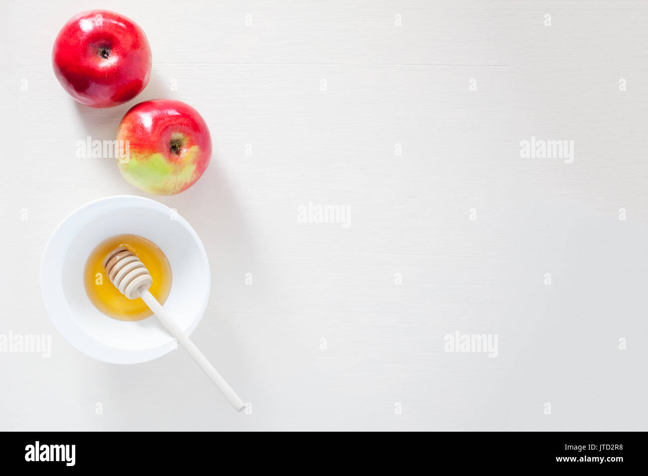 Apples, pomegranate and honey for Rosh Hashanah Stock Photo