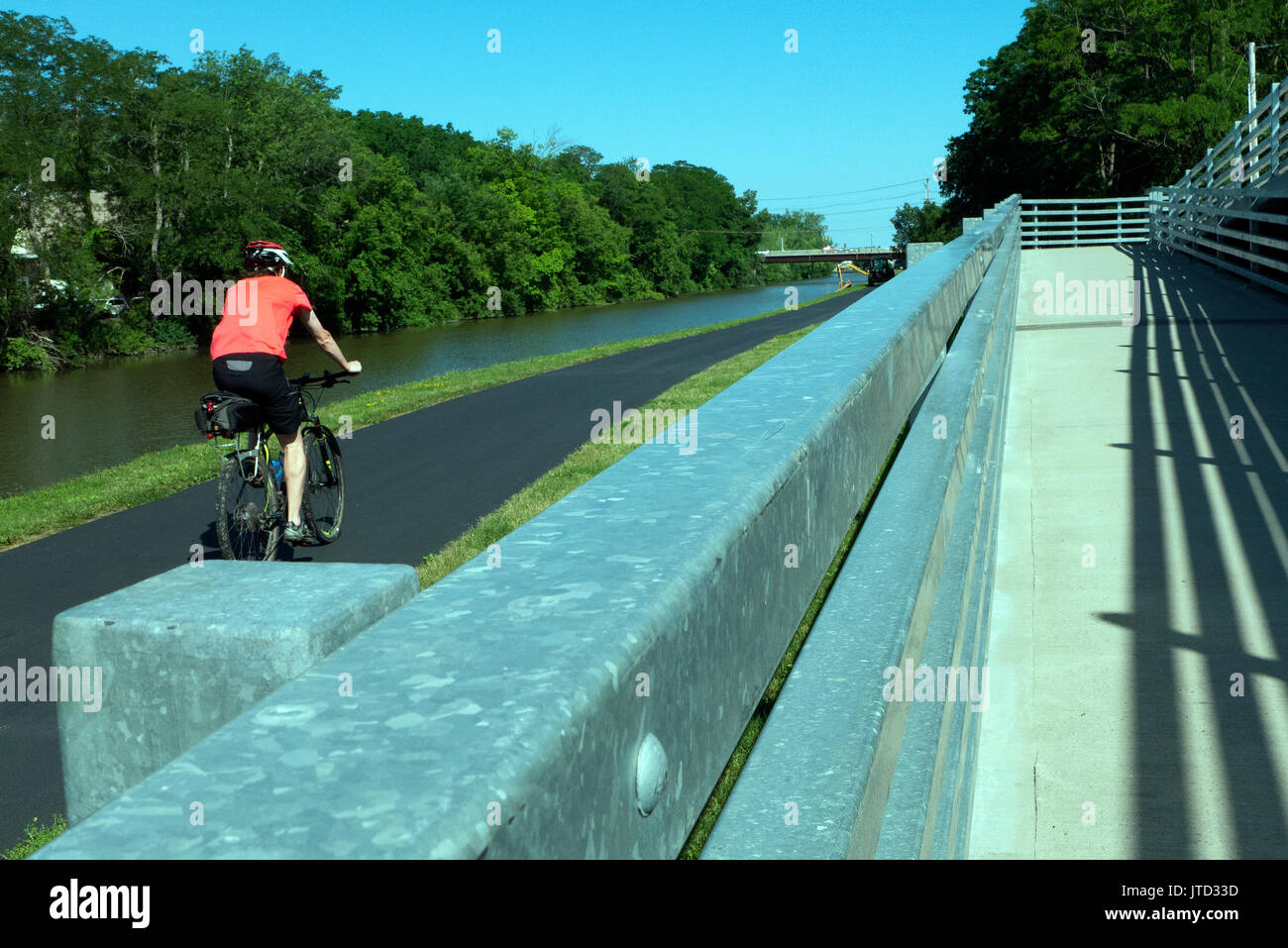 Biker on the Erie Canal path Stock Photo Alamy
