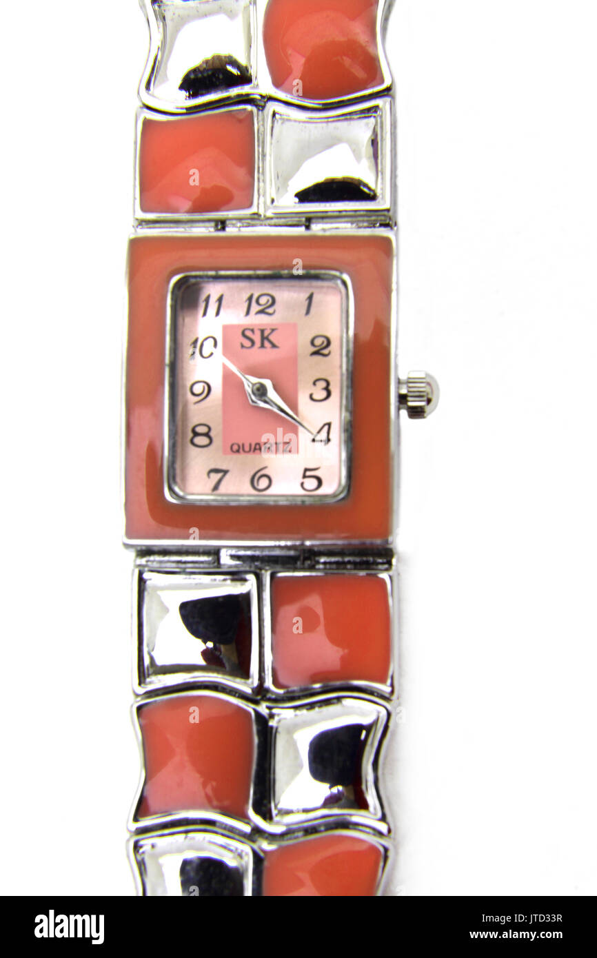 Stainless Steel and Pink Enamel  SK Shengke Wrist Watch Time 3:50 Stock Photo