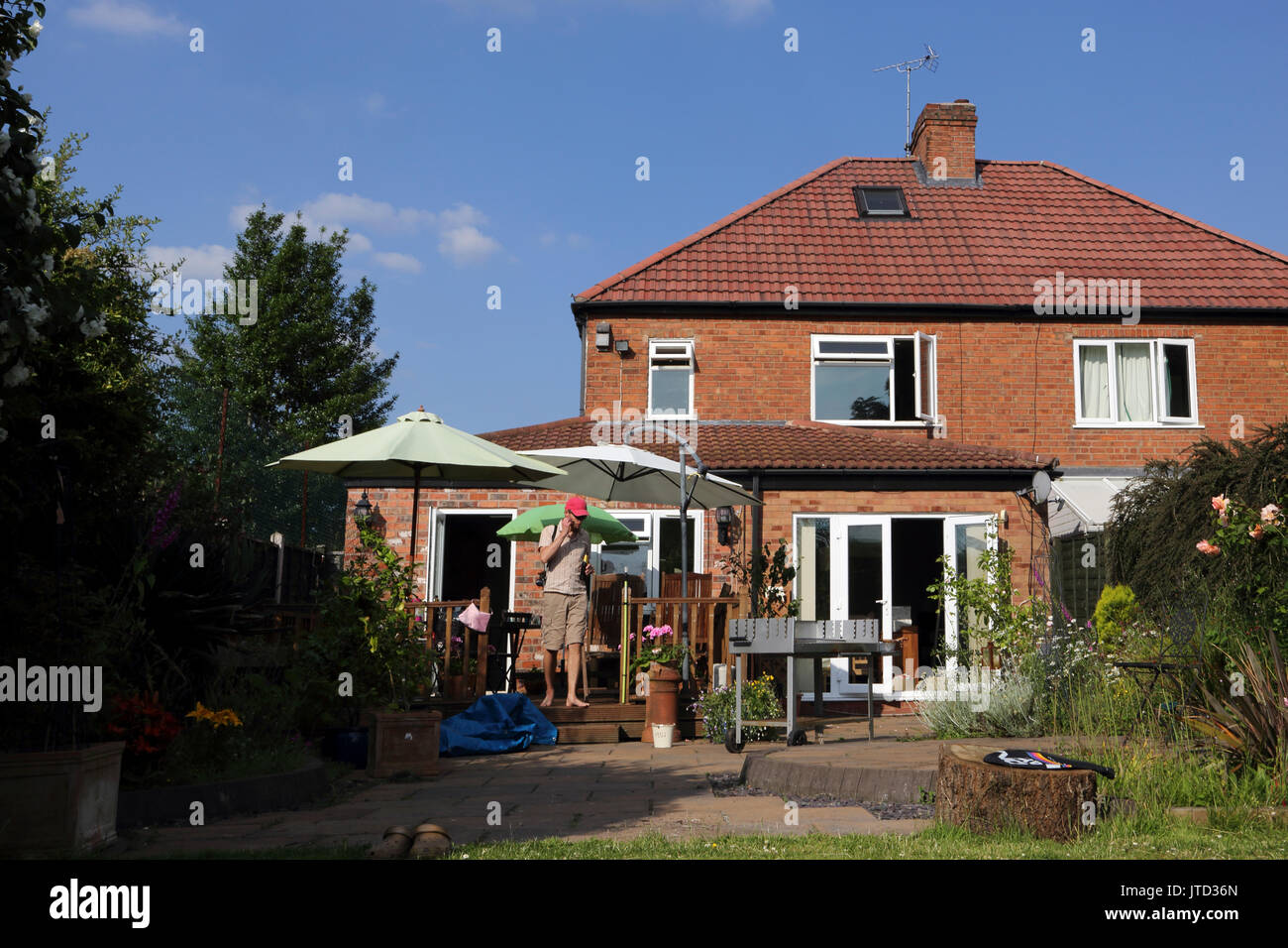 Semi Detached house with decking and patio in garden Birmingham West Midlands England Stock Photo