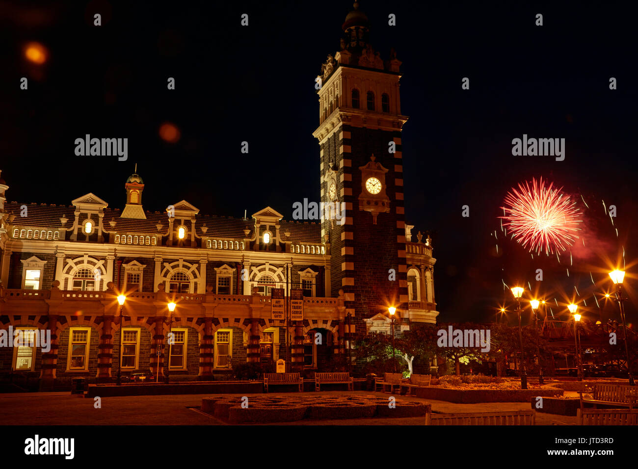 Historic Railway Station and fireworks, Dunedin, South Island, New Zealand Stock Photo