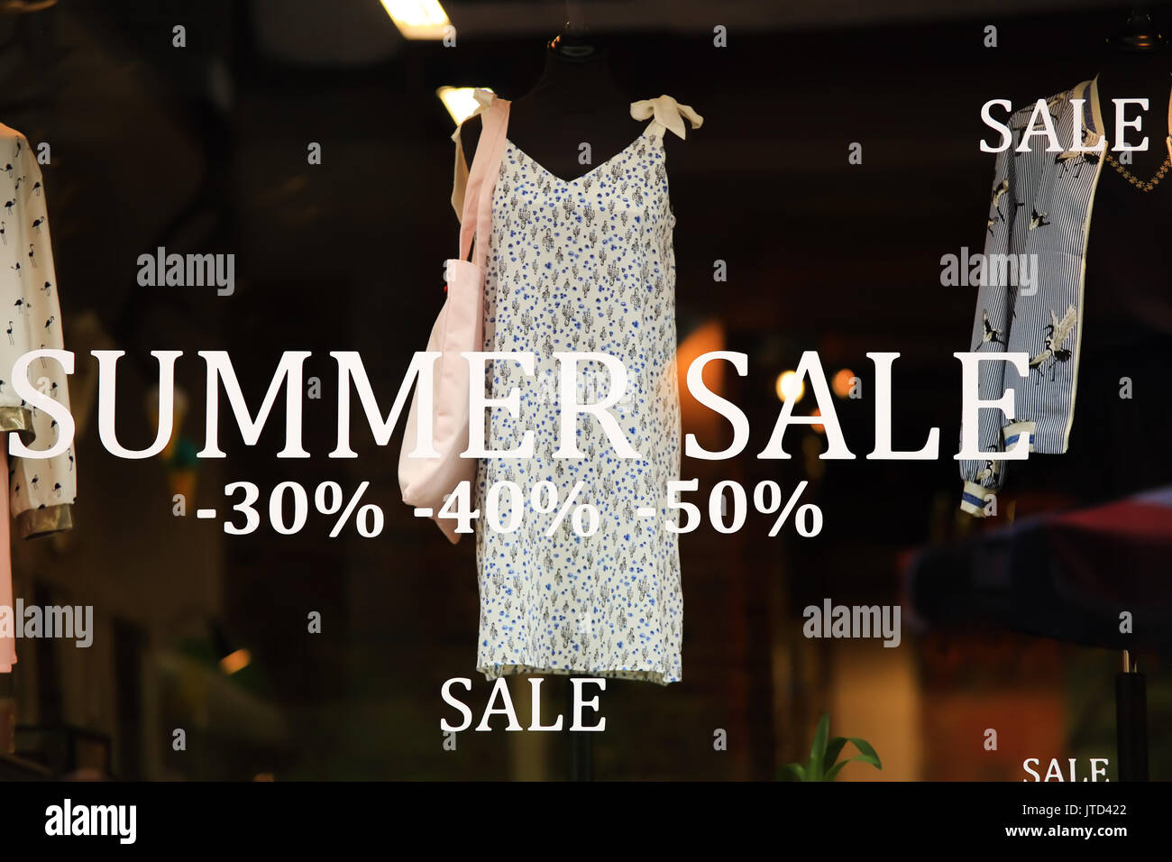 Summer sale concept. Storefont with discount signs. Stock Photo