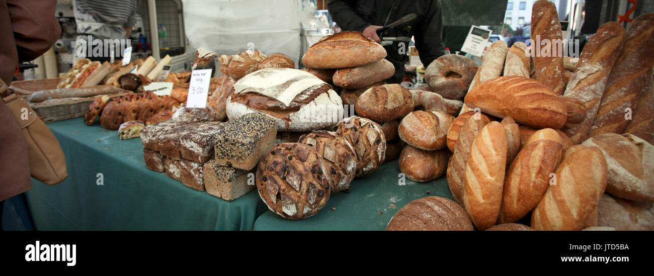 Fresh bread on counters for sale Stock Photo