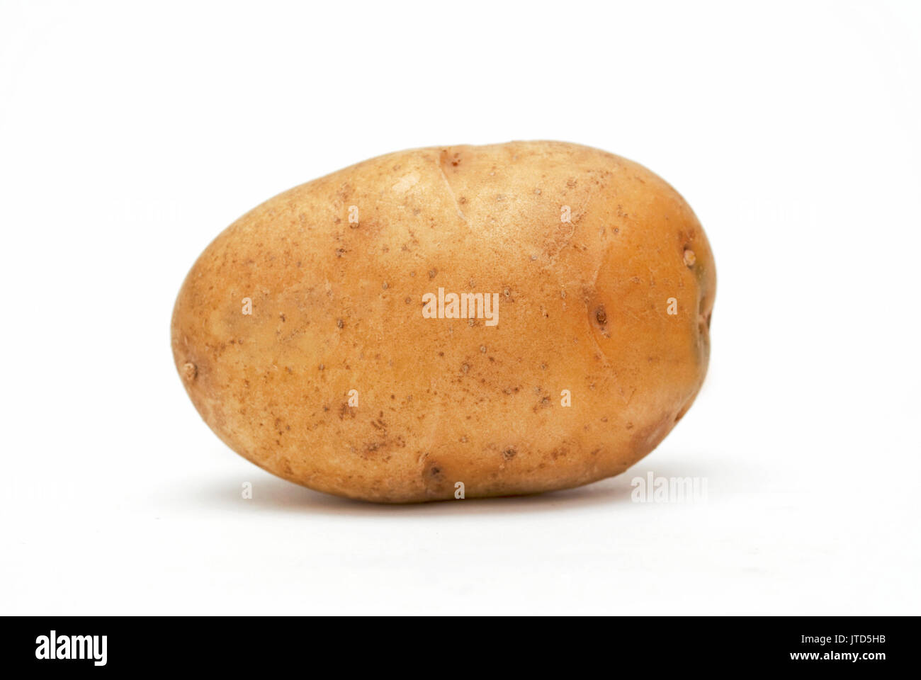 Single large potato isolated against a white background Stock Photo