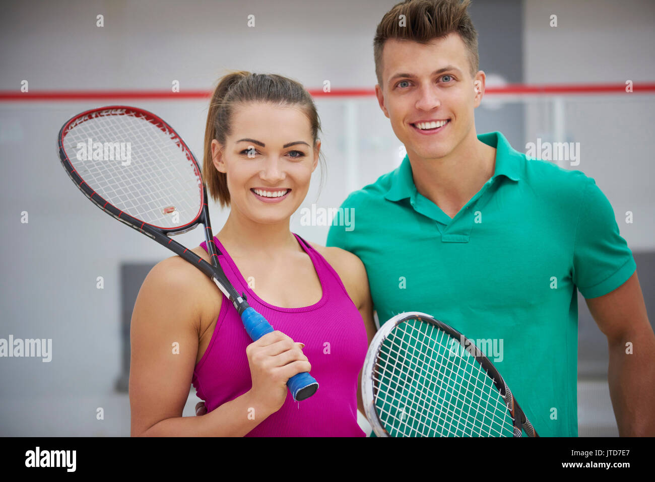 Young people and sport. Сквош женщины. В чем играют в сквош женщины. Squash photo stock. Сквош парный мужчина и женщина.