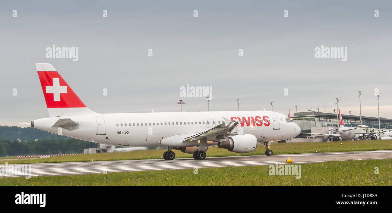 Swiss Airlines plane landing in Zurich early in the morning Stock Photo