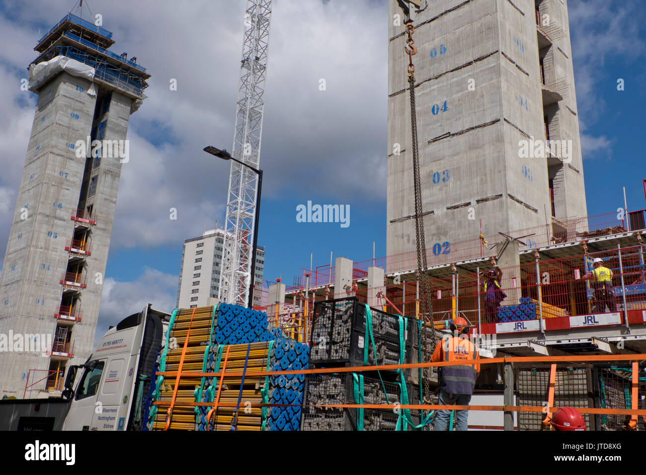 Hackney Tower Blocks Construction of new luxury apartments with social housing tower block ...