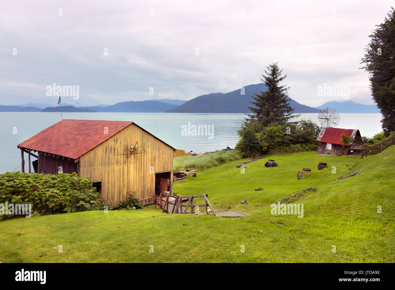 Wooden House next to the Petroglyph Beach, Wrangell, Southeast Alaska USA Stock Photo