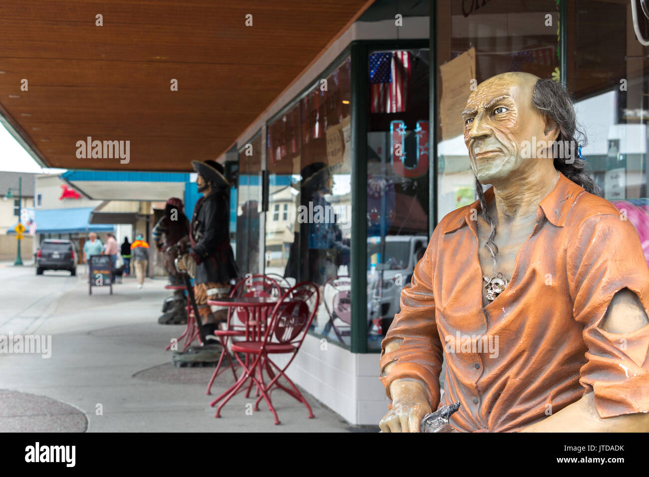 Wrangell, Alaska, USA - July 24, 2017: Pirate life size mannequin outside the Stikine Drug souvenirs store at the Front street. Stock Photo